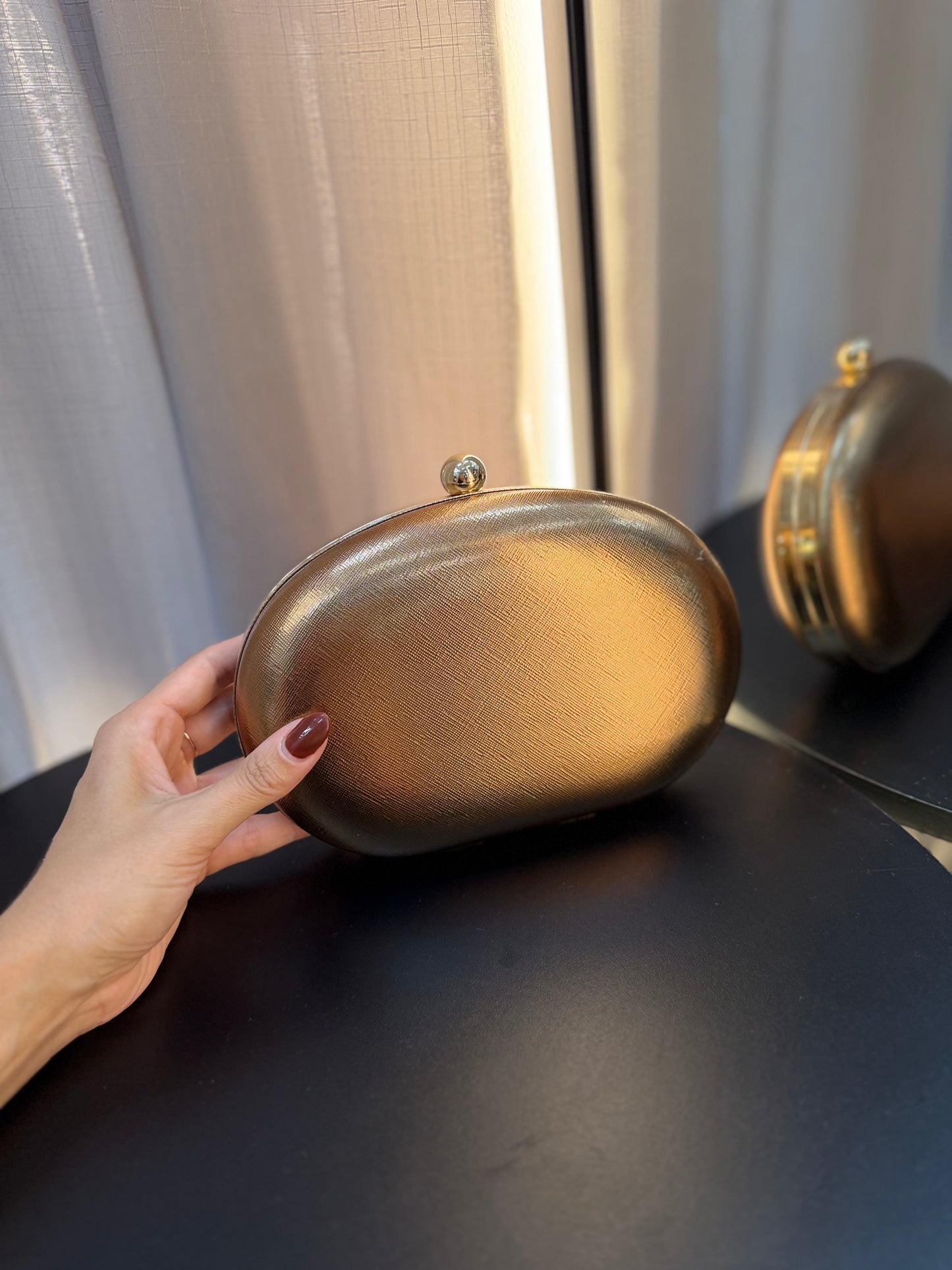 Cluth Oval Metalizada